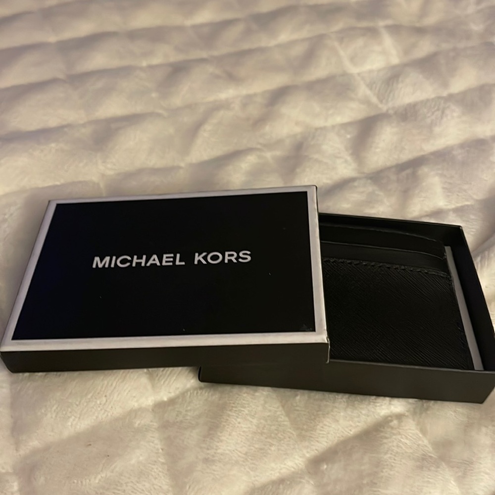 MK cardholder. New